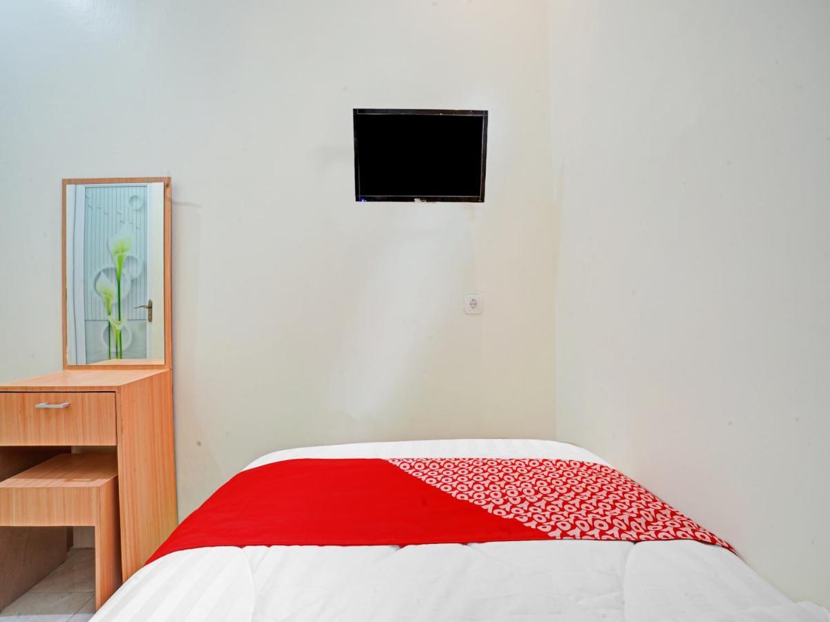 Oyo 90804 Oma Uti Syariah